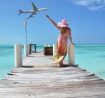 Girl on the wooden jetty. Exuma, Bahamas